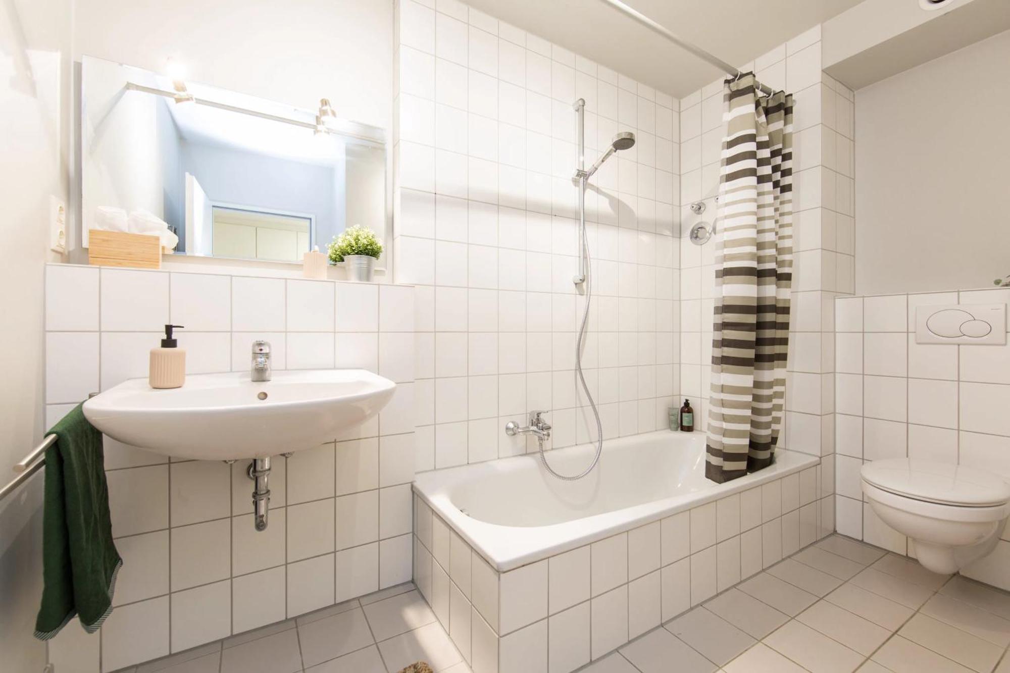 & Coliving Aparthotel *